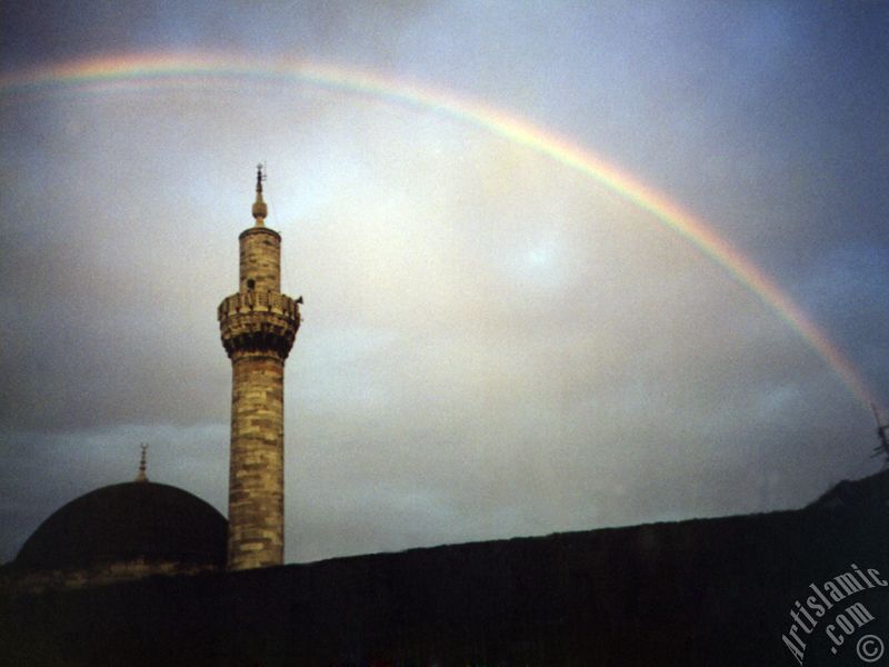 View of rainbow seen over Iskender Pasha Mosque after rain in Istanbul city of Turkey.
