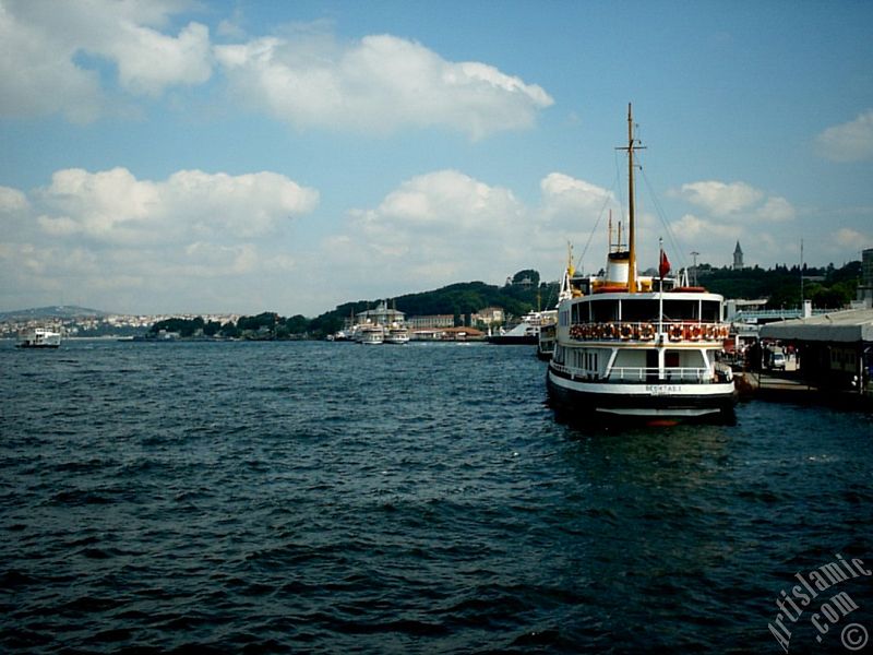 View of Eminonu shore, the jetty and the ships from the sea in Istanbul city of Turkey.
