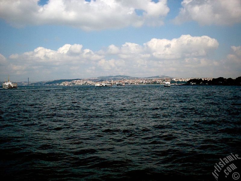 View of Sarayburnu coast and Camlica hill from the shore of Eminonu in Istanbul city of Turkey.
