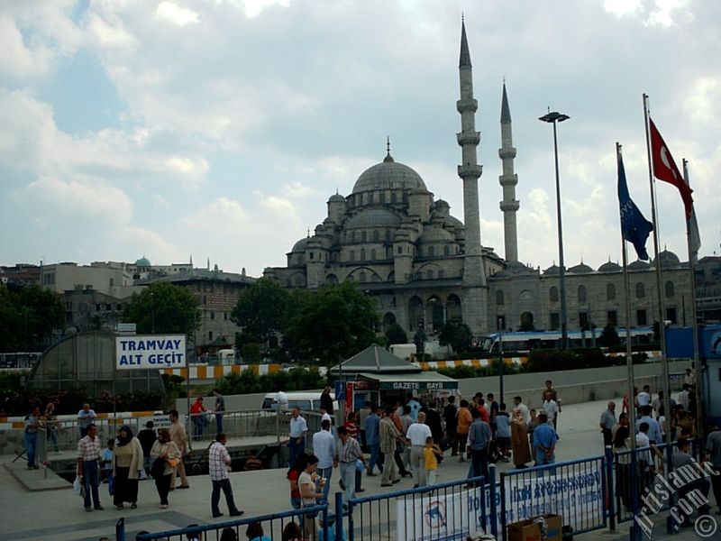 View of Yeni Cami (Mosque) and Eminonu square from the shore of Eminonu in Istanbul city of Turkey.
