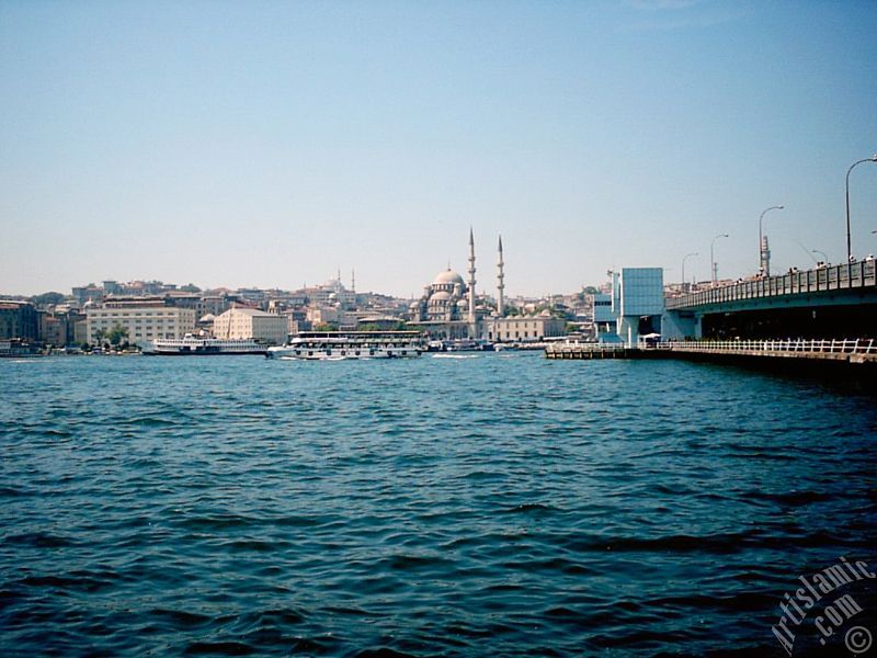 View of Eminonu coast, Sultan Ahmet Mosque and Yeni Cami (Mosque) from the shore of Karakoy in Istanbul city of Turkey.

