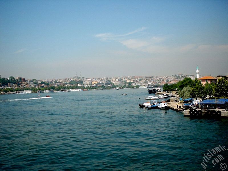 View of Sarachane coast, on the horizon on the left Fatih Mosque, on the right Yavuz Sultan Selim Mosque and a small mosque from Galata Bridge located in Istanbul city of Turkey.
