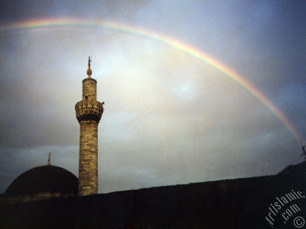 View of rainbow seen over Iskender Pasha Mosque after rain in Istanbul city of Turkey.
