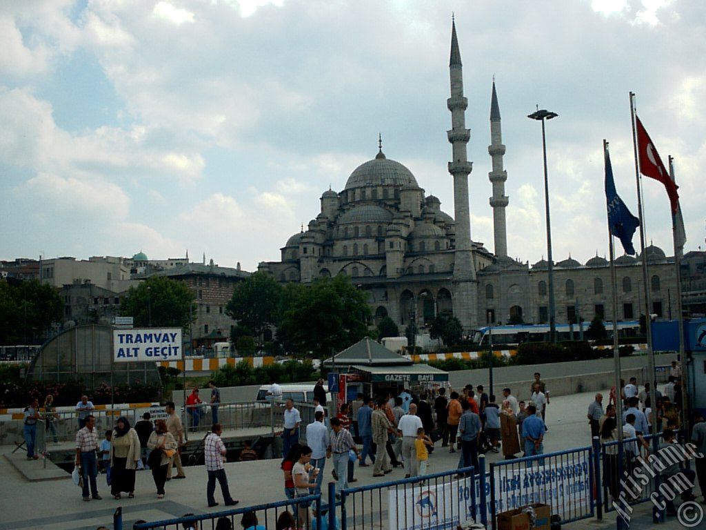 View of Yeni Cami (Mosque) and Eminonu square from the shore of Eminonu in Istanbul city of Turkey.
