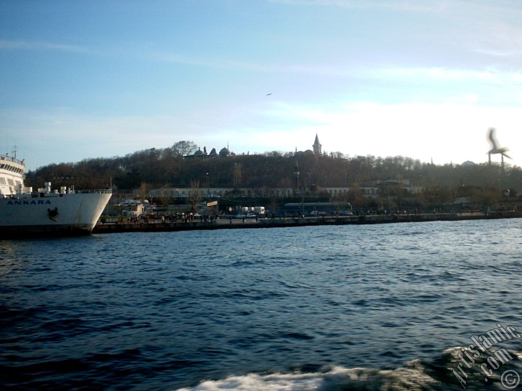 View of Sarayburnu coast, ships and Topkapi Palace from the sea in Istanbul city of Turkey.
