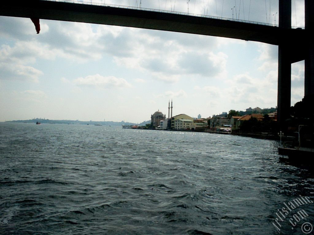 View of Ortakoy coast, Bosphorus Bridge and Ortakoy Mosque from the Bosphorus in Istanbul city of Turkey.
