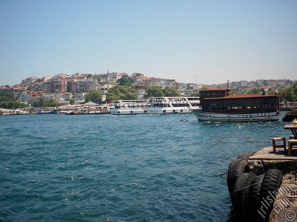 View of the shore and a fisher boat in Uskudar district of Istanbul city of Turkey.
