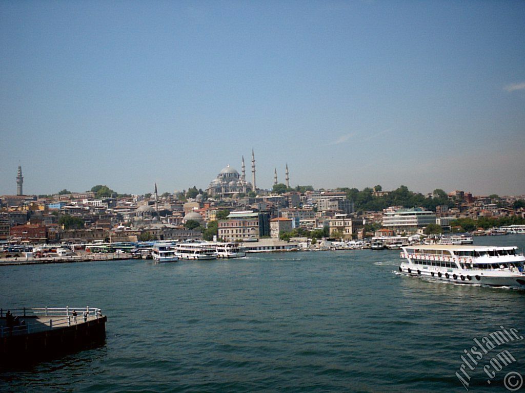 View of coast, (from left) Beyazit Tower, below Rustem Pasha Mosque and above it Suleymaniye Mosque from Galata Bridge located in Istanbul city of Turkey.
