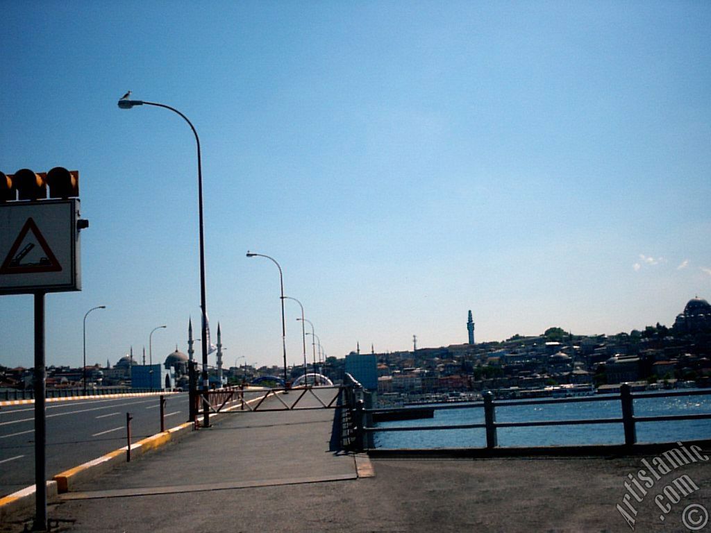 View towards the shore, (from right) Suleymaniye Mosque, Beyazit Tower, (at far behind) Beyazit Mosque, Yeni Cami (Mosque) and Sultan Ahmet Mosque (Blue Mosque) from Galata Bridge located in Istanbul city of Turkey.
