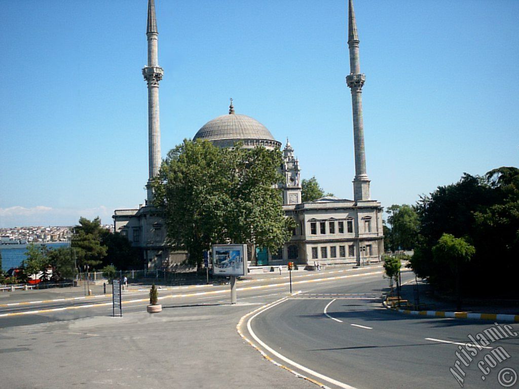 View of Dolmabahce coast and Valide Sultan Mosque in Dolmabahce district in Istanbul city of Turkey.

