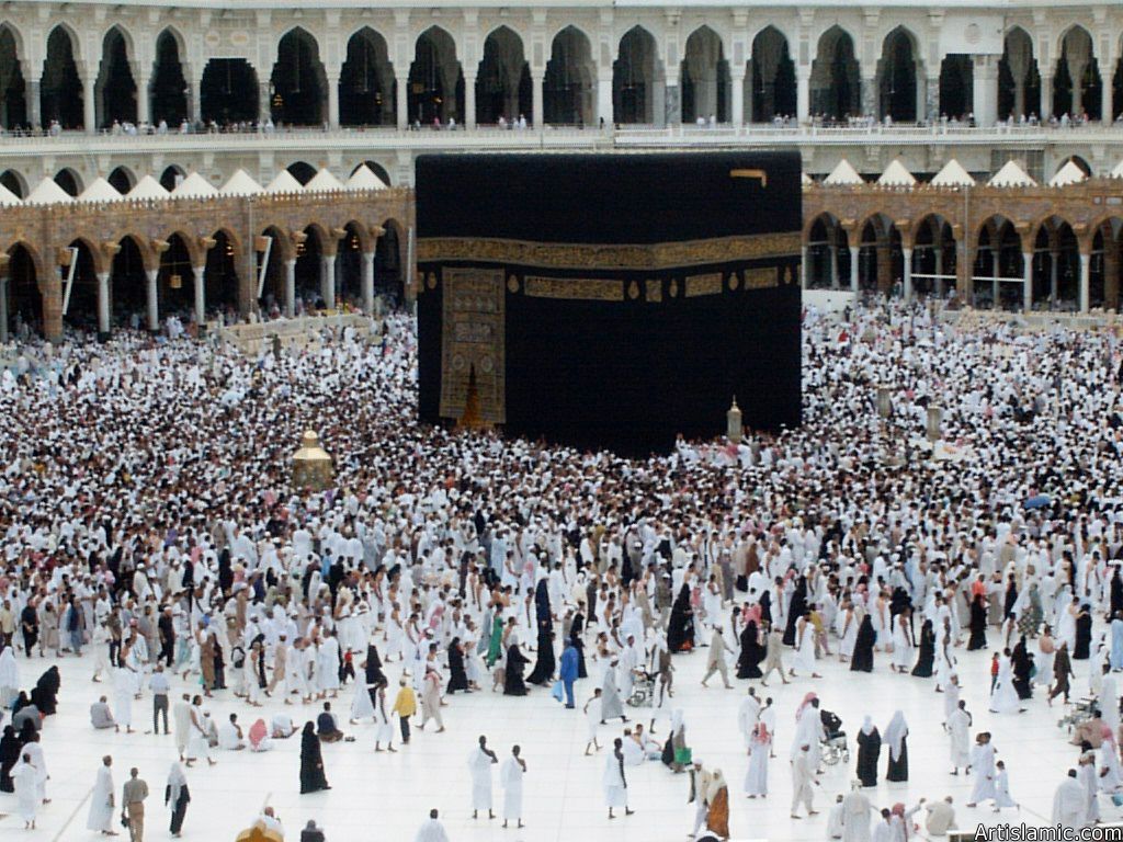 The Holy Kabah, Station of Abraham (golden blond matter on the left), Hicr Esmael (right to Kabah) and the muslims from every counrty circumambulating the Kabah in the Masjed al-Haraam in Mecca city of Saudi Arabia.
